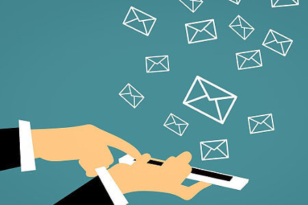 Graphic of Email Deliverability with person on a phone sending out a batch of emails