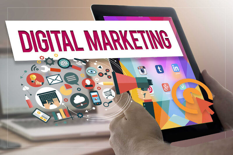 Virtual digital marketing icons and graphics coming out of a tablet